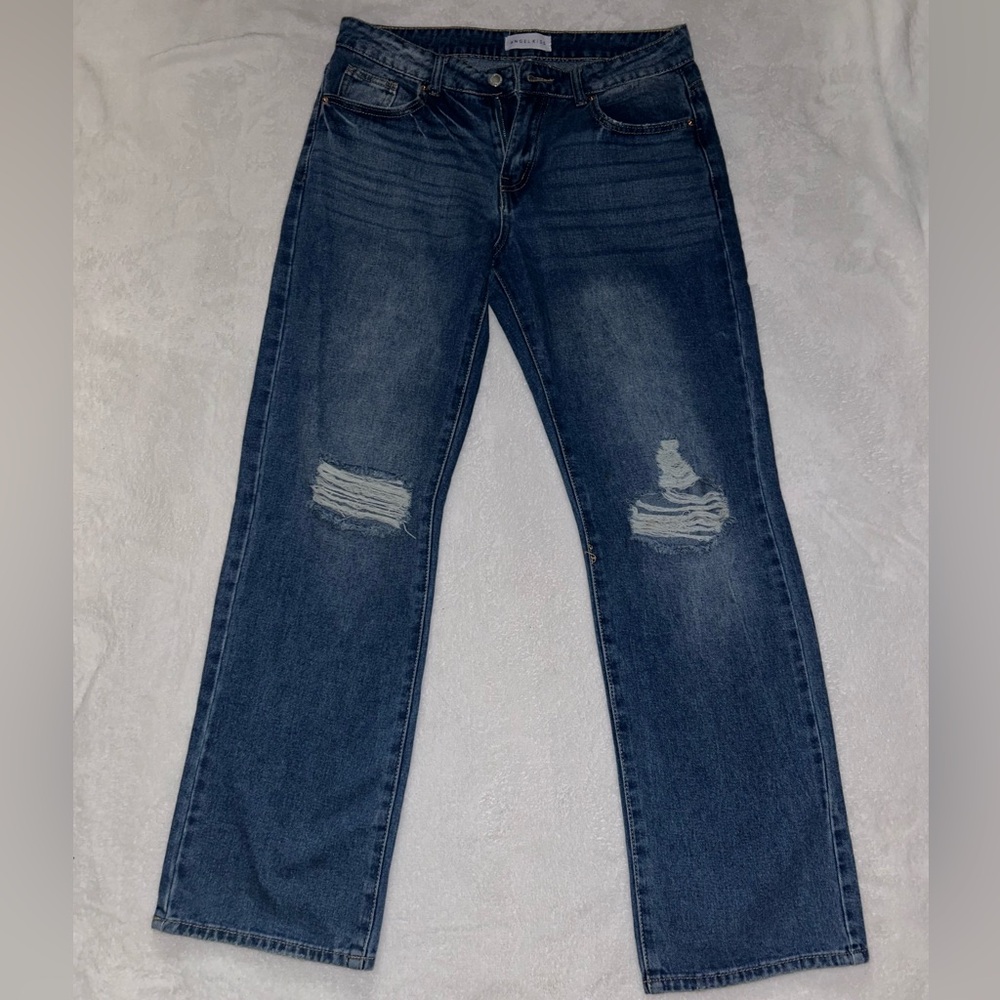 Distressed Blue Jeans